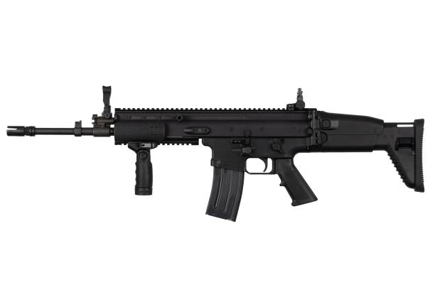 istock US Army SCAR-L carbine isolated on a white. 1454529361