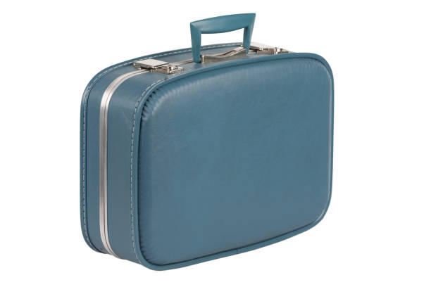 istock Vintage open blue suitcase isolated on white background. 1454529394
