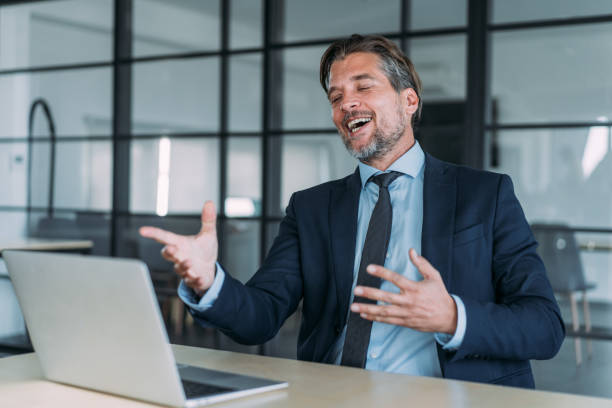 istock Businessman having video call in the office. 1454530411