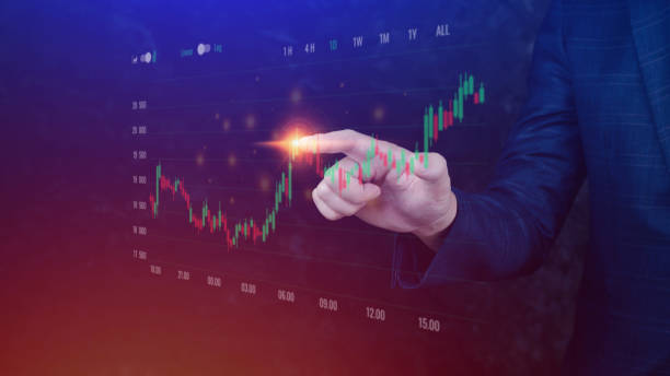 istock Businessman finger touch symbol stock graph and chart background, concept growth and development business investment, Stock market and strategy making market plan and stock market fluctuations 1454530793