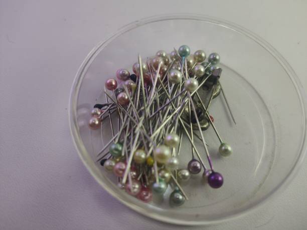 istock a collection of colorful safety pins 1454530868