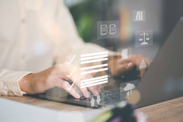 istock Businessman checking the steps through a virtual online document with a list of checkboxes Concepts of practices and policies, company articles of association Terms and Conditions 1454531527