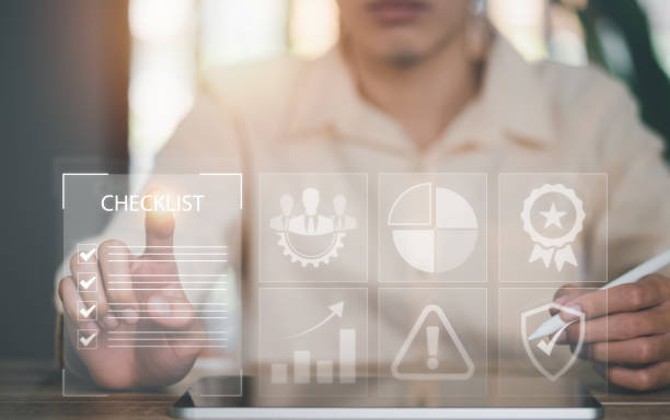 istock man check mark about exploring topics,In the virtual form check sheet,checklist ideas, checkbox to conduct opinion and quality surveys or satisfaction,Connect and work with modern wireless technology 1454531528