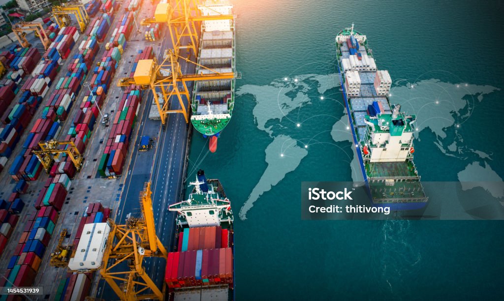 Aerial top view containers ship cargo business commercial trade logistic and transportation of international import export by container freight cargo ship with on worldmap Freight Transportation Stock Photo