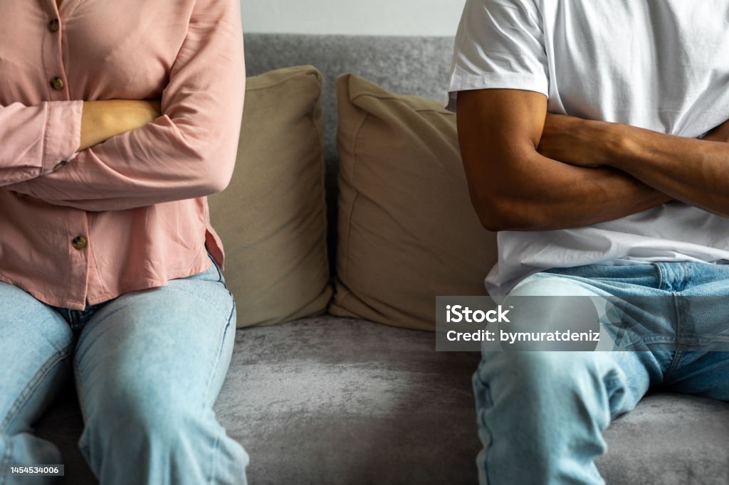 Couple having a disagreement at home Couple - Relationship Stock Photo