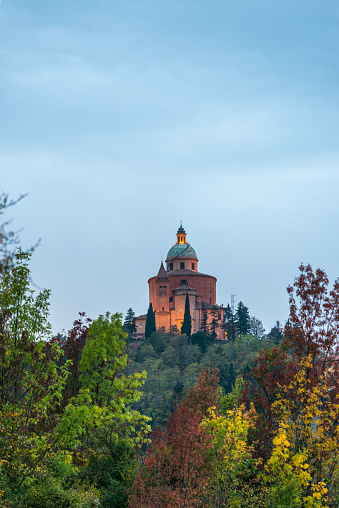 Sanctuary of the Madonna di San Luca in Bologna, Italy at dusk, seen from San Pellegrino park.