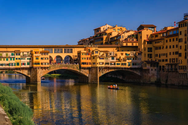 istock Famous Ponte Vecchio bridge with silversmith shops on Arno River, Florence Italy 1454535276