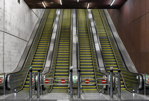 A view of empty escalators in a metro station at Fovam her in Budapest, Hungary