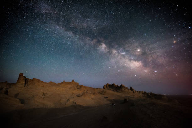 istock Scenic view of the rocks under the starry night sky 1454537158