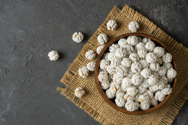 istock White sugar coated roasted chickpeas, turkish traditional nuts, round small confectionery 1454537325