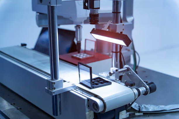 istock robotic arm manipulator moving on conveyor belt. Manufacturing, engineering, industrial, ai, automated technology concept 1454542259