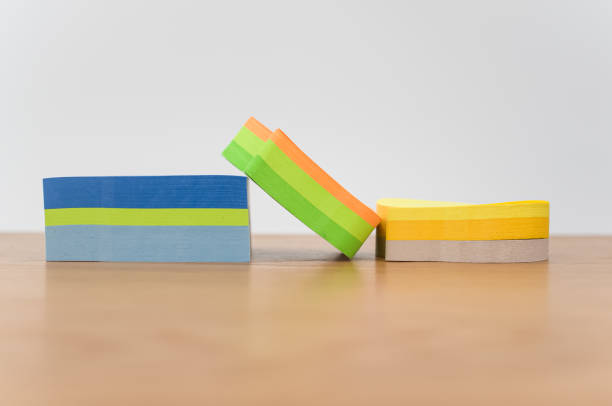 istock blank and colorful sticky note sheets on a wooden worktop 1454542348
