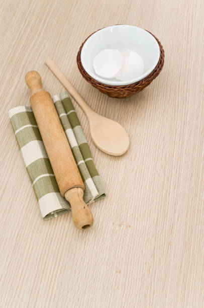 istock natural solid wood kitchen tools and table napkin with eggs on a wooden tabletop 1454545143