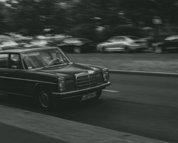 Berlin, Germany – January 30, 2021: An oldtimer Mercedes-Benz driving by on a street in Berlin, Germany