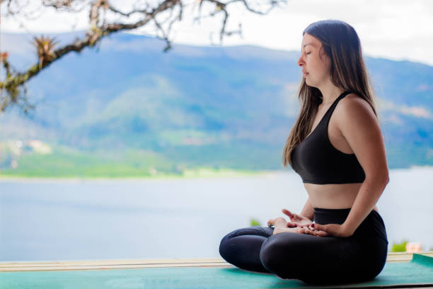 istock Beautiful Hispanic female in the garden doing exercises 1454545836