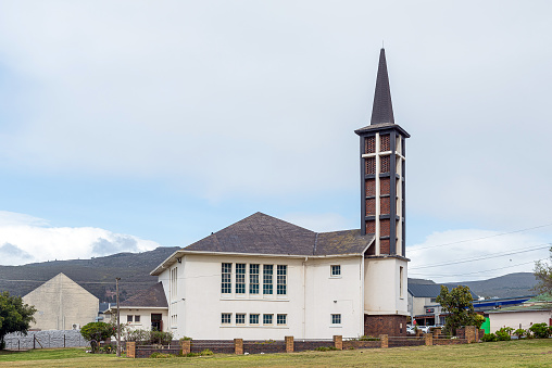 Bredasdorp, South Africa - Sep 23, 2022: A street scene, with the United Reformed Church, in Bredasdorp in the Western Cape Province