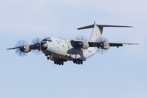 Graz, Austria – May 14, 2022: A Royal Air Force Airbus A400M military cargo aircraft landing in Graz in Austria in front of blue skies