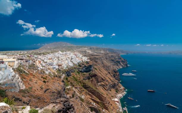 Blue sky over white Santorini view of the city of Fira on a sunny day The blue sky over white Santorini view of the city of Fira on a sunny day fira santorini stock pictures, royalty-free photos & images