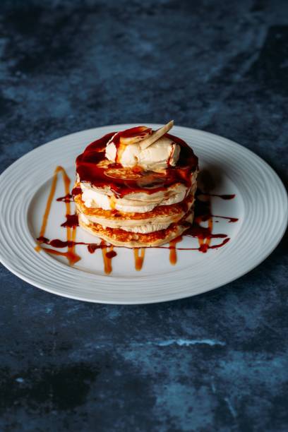 Pancake with whipped cream and caramel on top