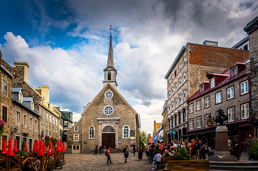Québec City, Canada - August 22, 2022: View to a church at petit champlain district. Québec City is the capital of the largely French-speaking Canadian province of Québec.