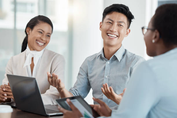 istock Diversity, team and happy business tech meeting, tech startup and entrepreneurs conversation together. Corporate managers smile, digital marketing report plan and online stratergy in workplace office 1454560429