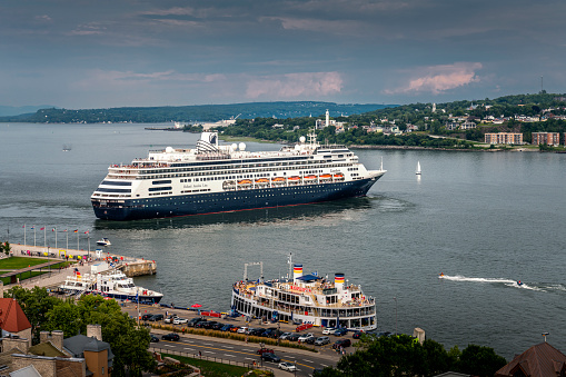 Québec City, Canada - August 21, 2022: A cruise ship and Saint Lawrence river in Québec City in Canada. Québec City is the capital of the largely French-speaking Canadian province of Québec.