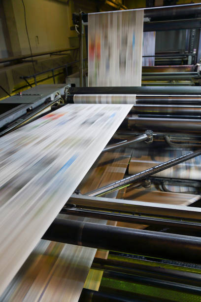 istock Newspaper printing press in a printing plant 1454565050