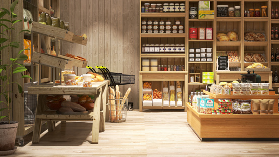 Blurred organic, eco-friendly and vegan grocery and bakery store with wooden wall, parquet floor, variety of bread, bun, bagel, snack on shelf for healthy shopping lifestyle, interior design decoration background