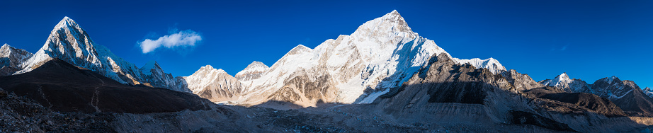 A multi photo panorama of the Grand Teton Mountain Range.