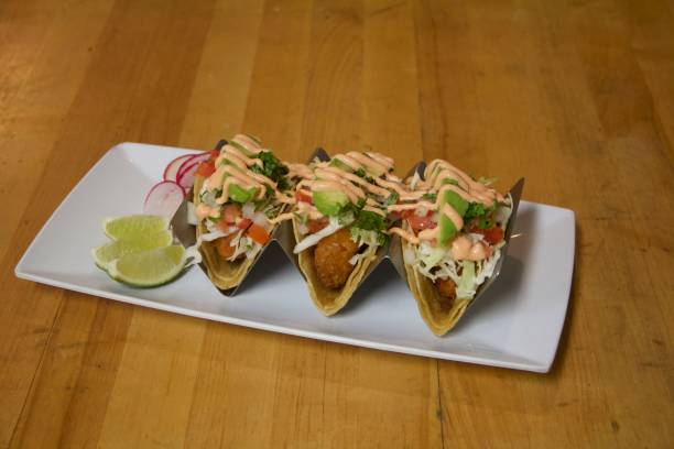 istock Closeup of Mexican tacos on plate 1454578248
