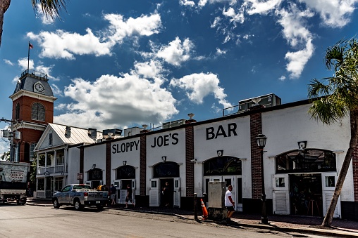Key West, United States – May 16, 2016: The Sloopy Joe's Bar with tourists in Key West, Florida, USA