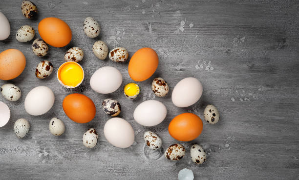 istock Top view of chicken and quail eggs on table 1454583180