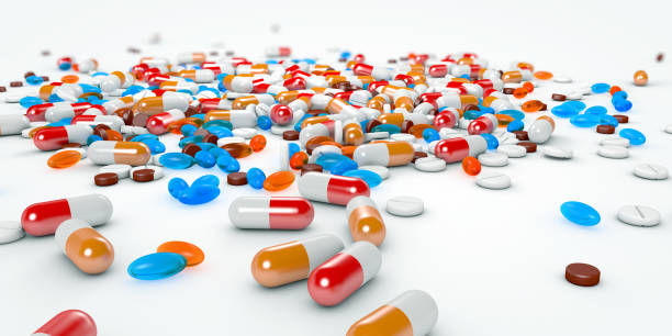 Many capsules, pills and tablets of medicines and food supplements - 3d illustration stock photo