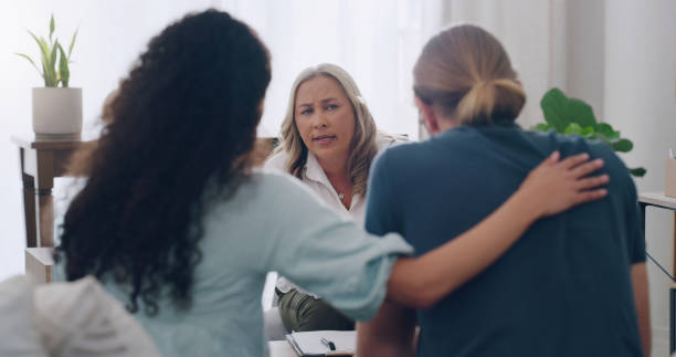 istock Marriage counseling, consulting and diversity couple with therapist for communication problem, help or support. Psychology, divorce therapy consultation and psychologist helping black woman and man 1454584168