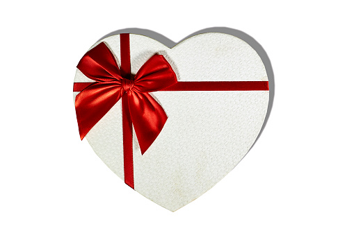 Heart and gift box isolated on white