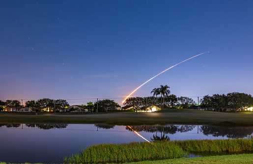The flight path to the moon of a space rocket launched from Cape Canaveral in Florida USA