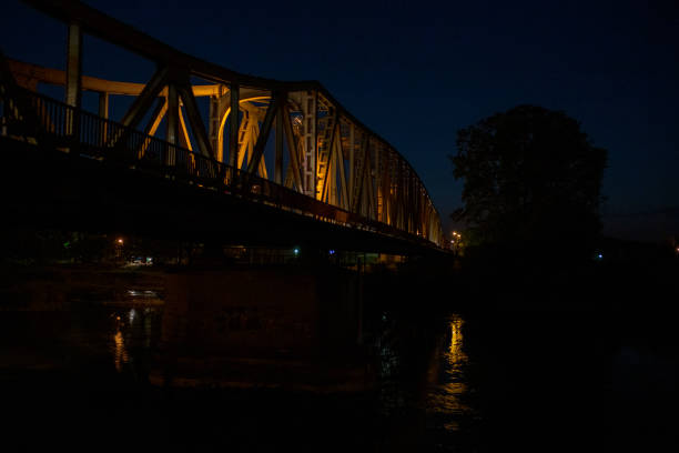 istock Traffic over water on a concrete bridge 1454589888