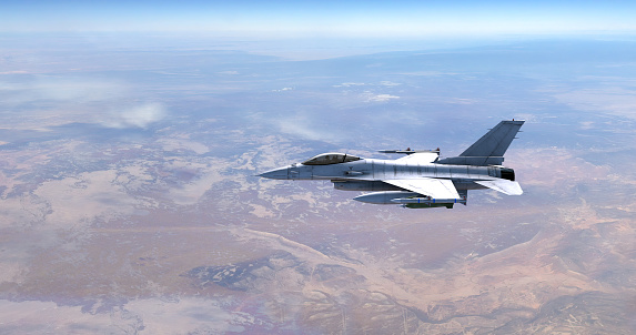  FA-18 airplane against a blue sky.