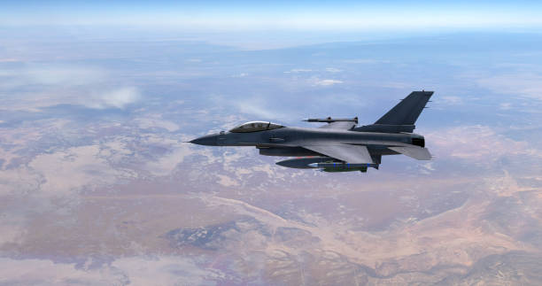 istock Advanced Fighter Jet Flying Above The Clouds. Accelerates And Disappears. 1454593218