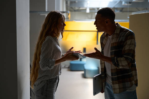 istock Two colleagues are quarreling in the office 1454593516
