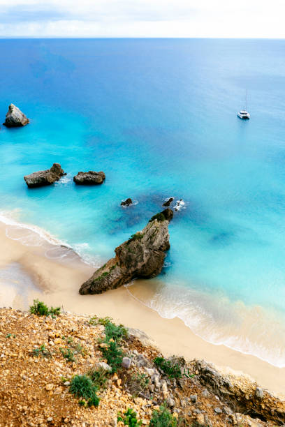 istock Crystal clear turquoise waters of a tropical beach 1454598961