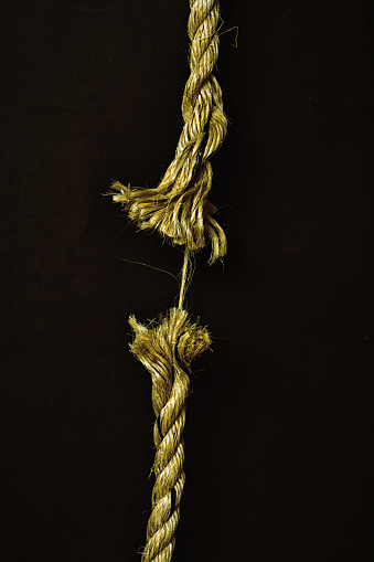 Rope is down to its last strand, literally hanging by a thread.