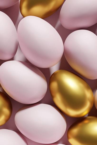 istock 3d render of pink and gold Easter eggs on a pastel pink background 1454618303