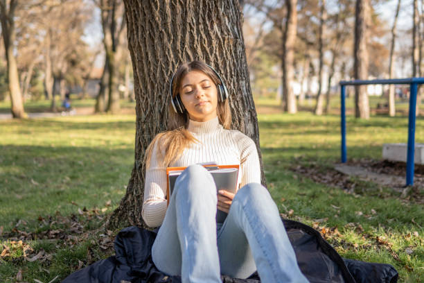 istock Student girl in the park 1454619314