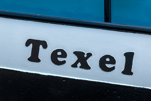 The name of the wadden sea island Texel on a Fishing trawler.