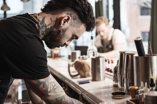 istock Two Young  barmen working at the bar 1454624727