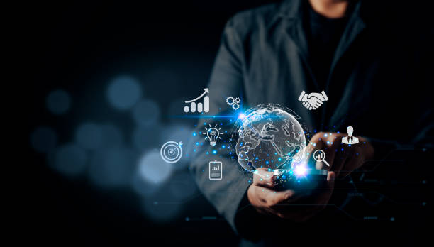 istock A businessman is using his mobile phone. Financial and banking, digital link technology, big data, business global internet connection application technology and digital marketing 1454625060