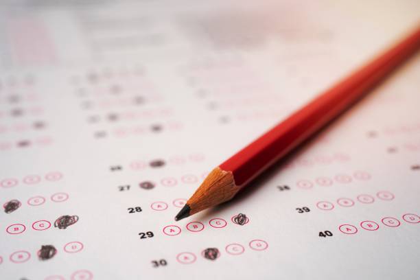 istock Answer sheets with Pencil drawing fill to select choice, education concept 1454631955