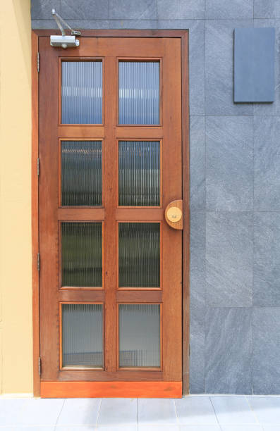 istock Door and granite wall background at the cafe. 1454632599
