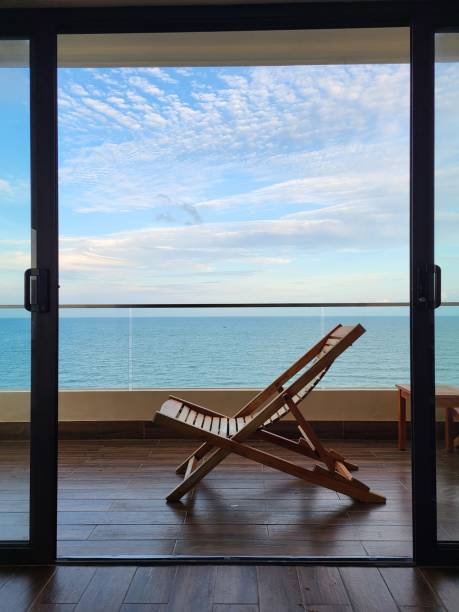istock deck chair with a view of the sea 1454634744